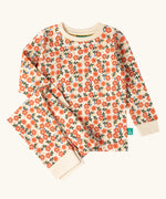Little Green Radicals petals kids organic cotton pyjamas. Cream coloured pyjamas with an all over repeat pink flower print.