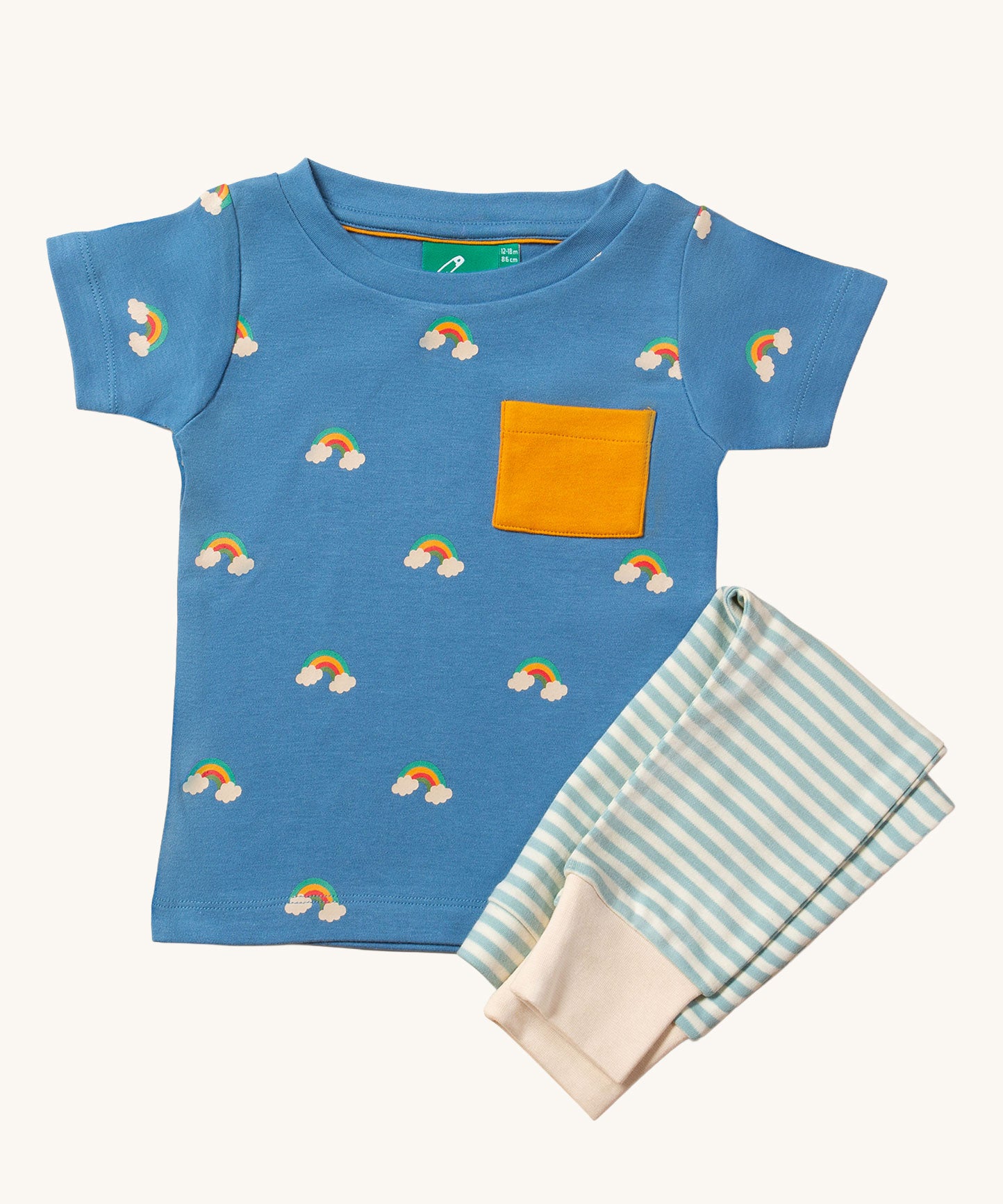 Little Green Radicals Kids' Organic T-shirt and Joggers Playset outfit in the  Blue Rainbows design. The joggers are light blue and white striped, the t-shirt has blue background with little rainbows dotted all over it. 
