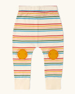 Little Green Radicals cream rainbow striped knee patch organic cotton kids joggers. The sunshine applique knee patches has embroidered details.