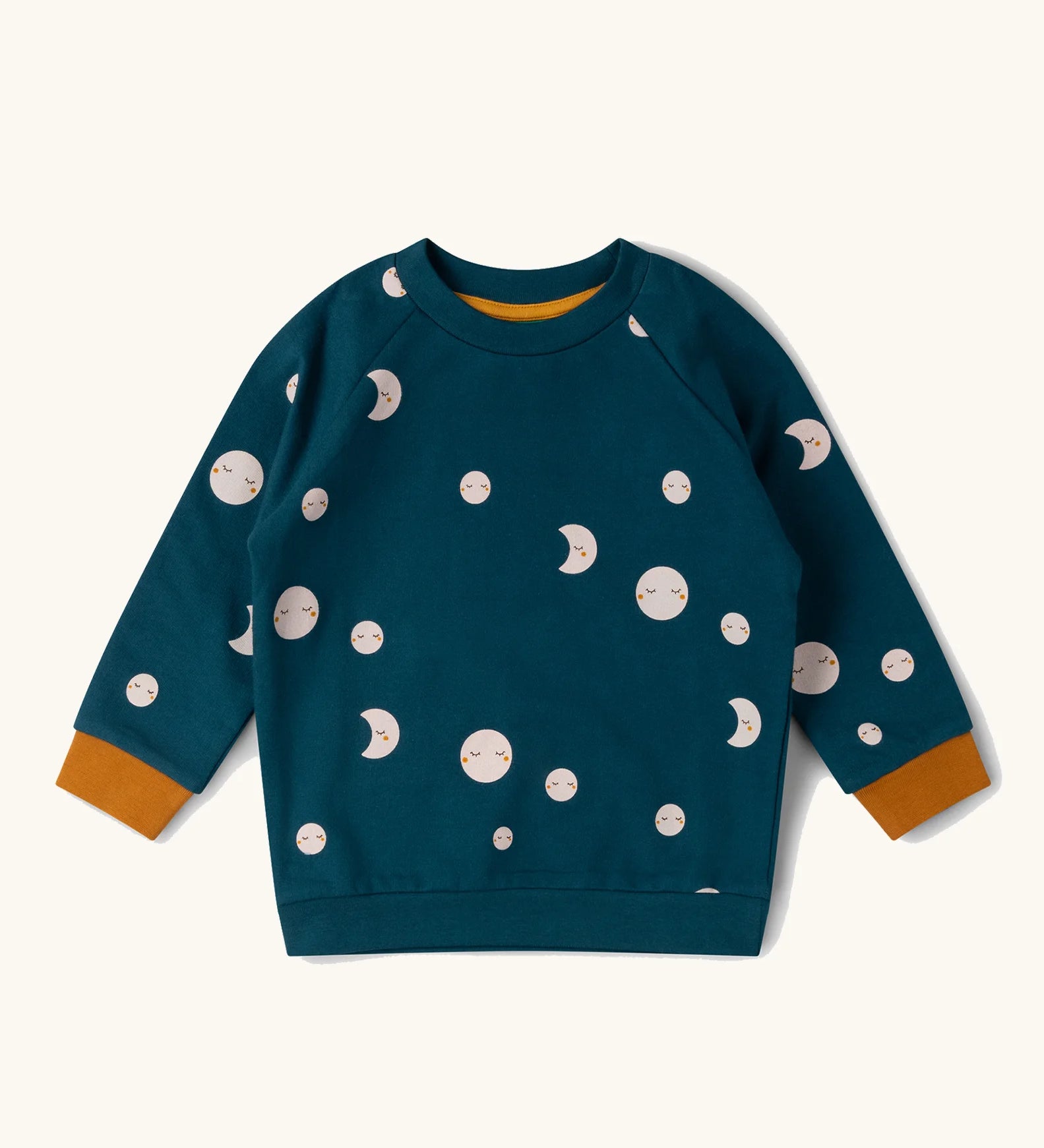 Little Green Radicals midnight moon print blue raglan organic-cotton children's sweatshirt with yellow cuff detail.