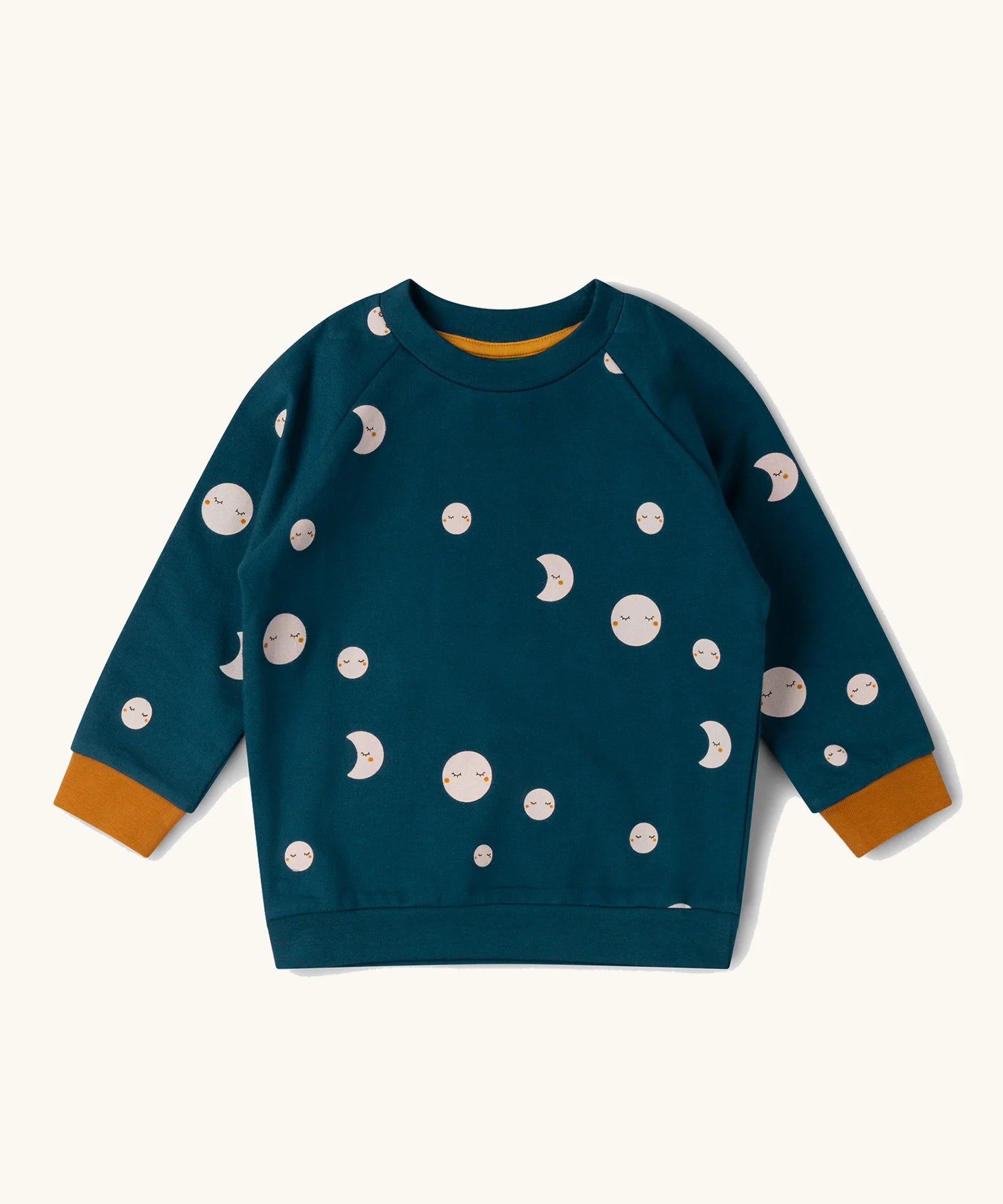 Little Green Radicals midnight moon print blue raglan organic-cotton children's sweatshirt with yellow cuff detail.