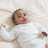little-green-radicals-natural-long-sleeve-wrap-worn-by-baby