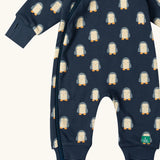 Close up of the Little Green Radicals navy blue penguins hooded reversible snug suit showing the zip opening down the leg.