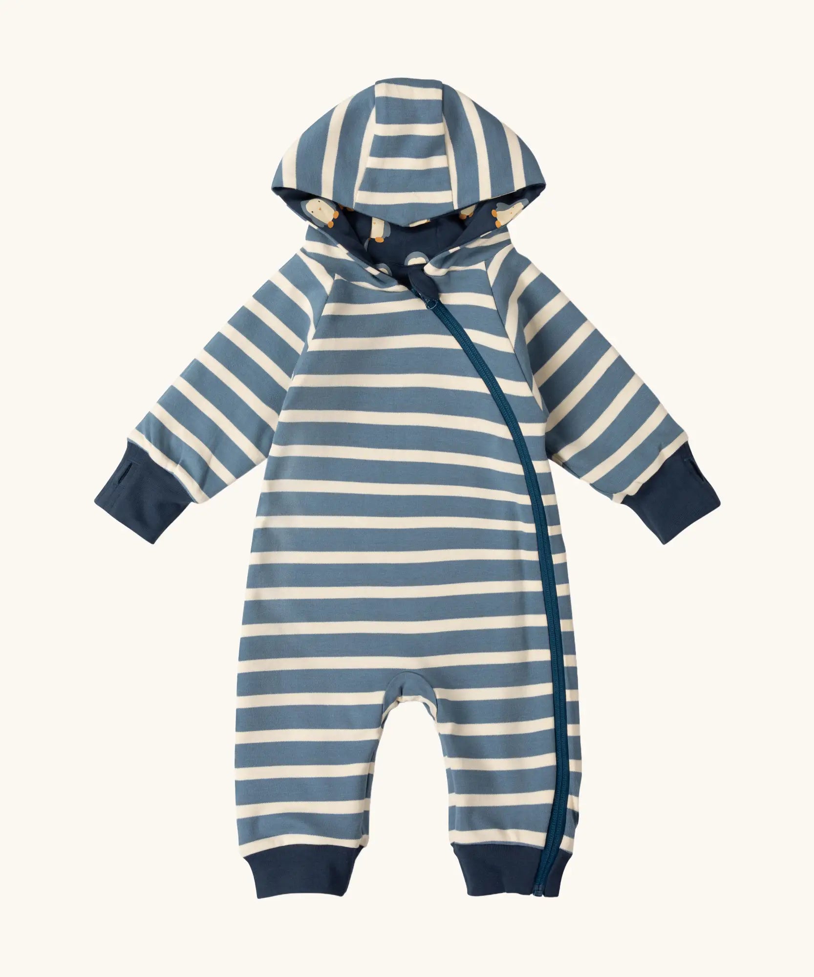  Little Green Radicals navy blue penguins hooded reversible snug suit shown on the blue and white striped side.