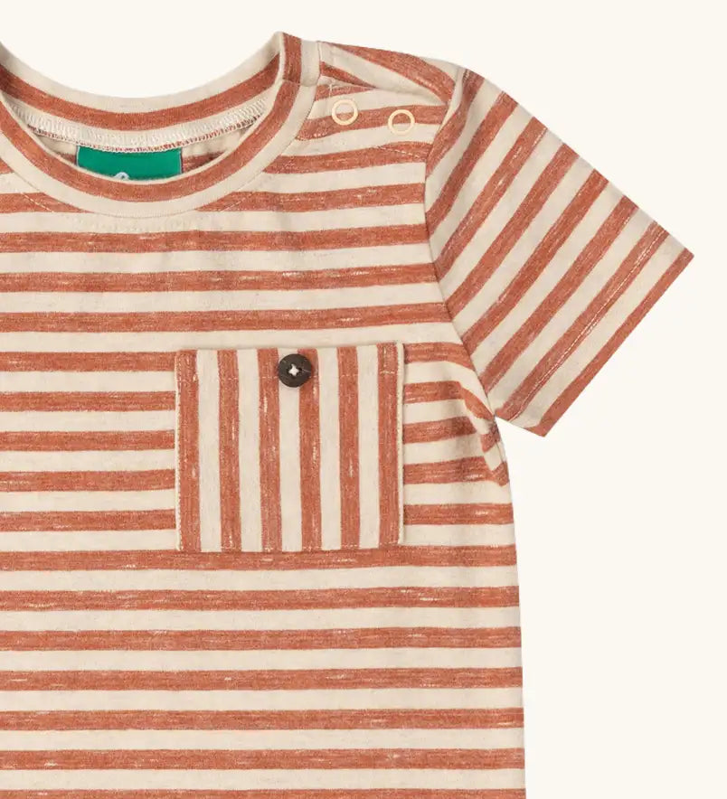 Close up of the buttoned chest pocket on the Little Green Radicals burnt ochre red striped short sleeve essential organic cotton t-shirt.