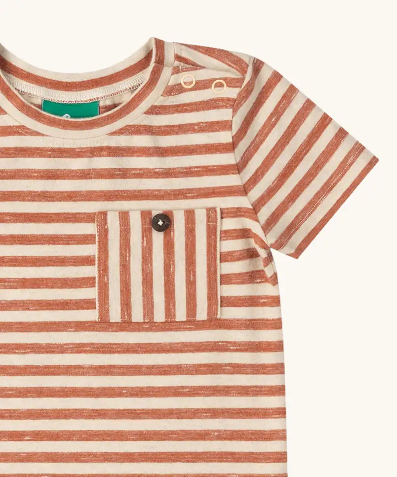 Close up of the buttoned chest pocket on the Little Green Radicals burnt ochre red striped short sleeve essential organic cotton t-shirt.