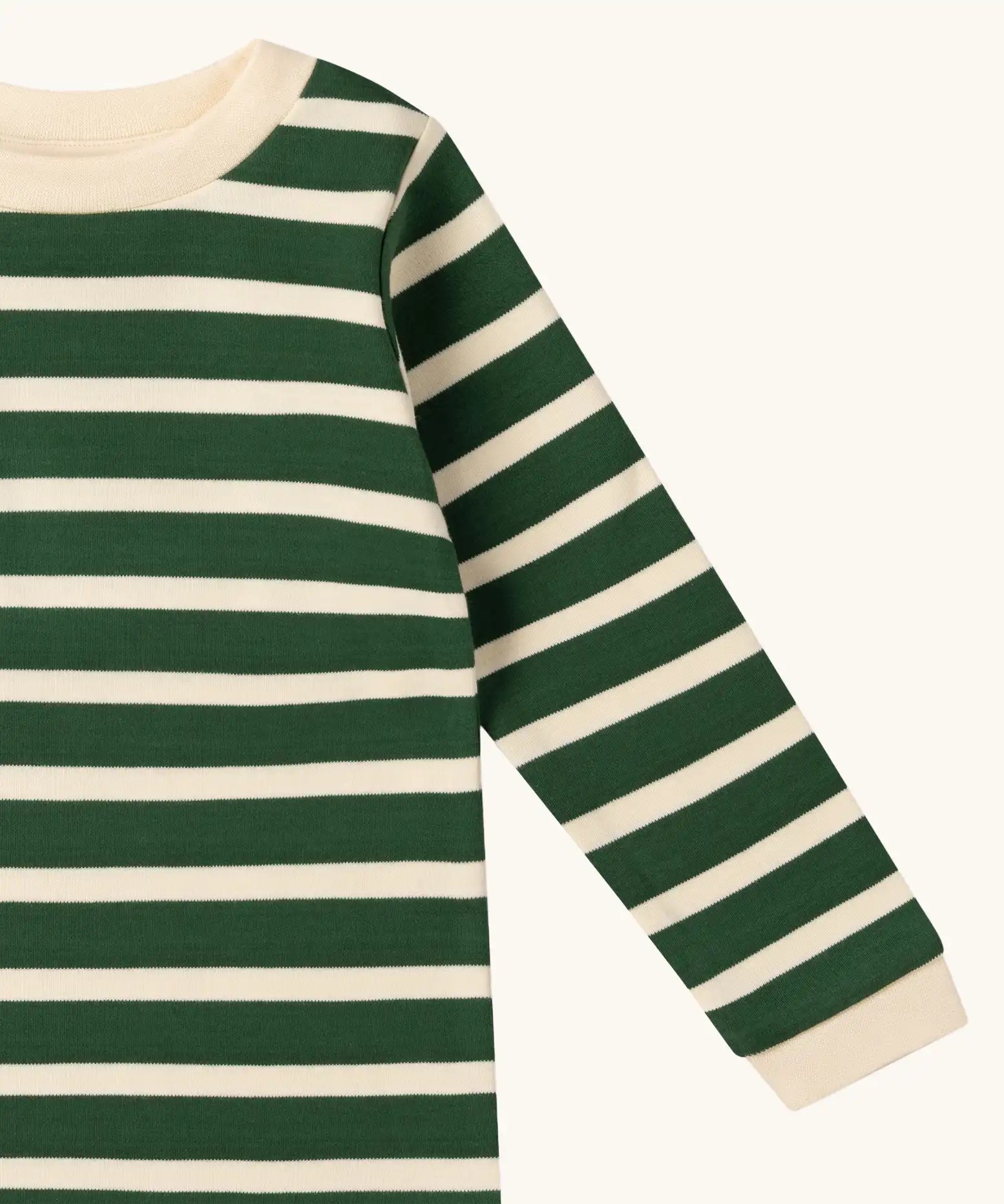 Close up of the Little Green Radicals olive stripe organic cotton long sleeve top.