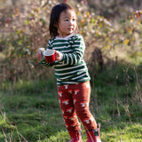 Child wearing the Little Green Radicals olive green striped long sleeve top with knitted mushroom joggers.