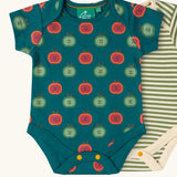 Close up of the apple print vest from the Little Green Radicals short sleeve baby bodysuit 2 pack. A repeat red and green apples print on a dark green background.