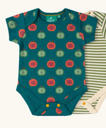 Close up of the apple print vest from the Little Green Radicals short sleeve baby bodysuit 2 pack. A repeat red and green apples print on a dark green background.