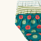 Close up of the Little Green Radicals children's Organic Underwear 3 Pack with apple print,  blue striped and green striped designs.