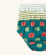 Close up of the Little Green Radicals children's Organic Underwear 3 Pack with apple print,  blue striped and green striped designs.