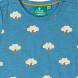 Close up of the poppered neck closure on the Little Green Radicals blue all weather repeat print organic cotton short sleeve t-shirt.