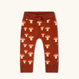 Little Green Radicals organic cotton children's knitted joggers with a mushroom design.