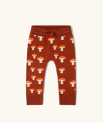 Little Green Radicals organic cotton children's knitted joggers with a mushroom design.