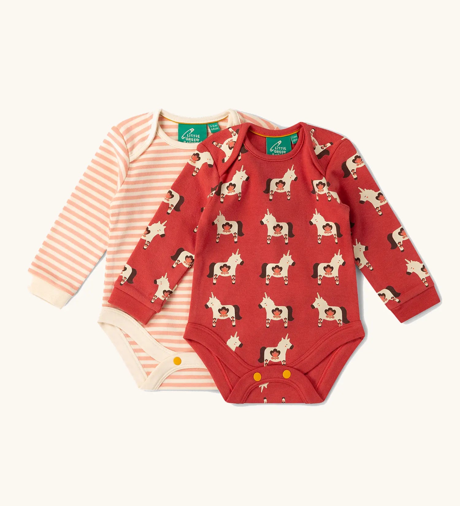 Little Green Radicals organic cotton long-sleeve baby bodysuits 2 Pack. One pink vest with all over unicorns print and one pink and white striped vest.
