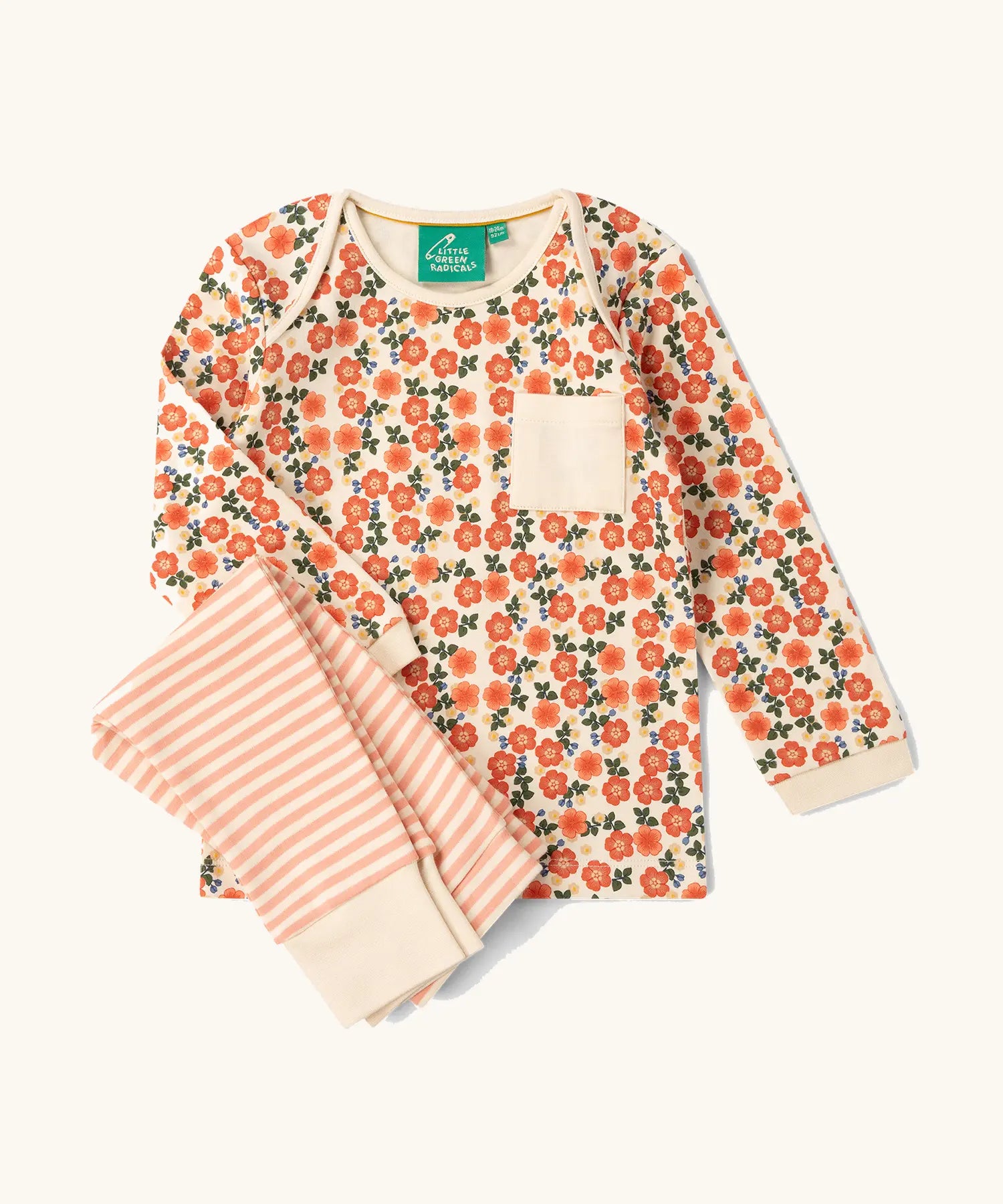 Little Green Radicals organic cotton long sleeve top and jogger playset with pink petals flowers design on the top and pink and white stripes on the trousers.
