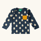 Long sleeved top from the  Little green Radicals blue penguin design playset outfit.