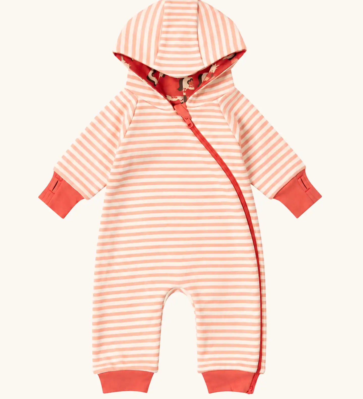 Little Green Radicals pink unicorns organic cotton reversible snug suit. One side is pink with a repeat unicorns print, the other is light pink and white striped. 