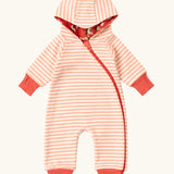 Little Green Radicals pink unicorns organic cotton reversible snug suit. One side is pink with a repeat unicorns print, the other is light pink and white striped. 