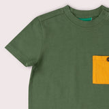 Closeup of organic cotton single jersey fabric of the Little Green Radicals Essential T-Shirt in chive green.