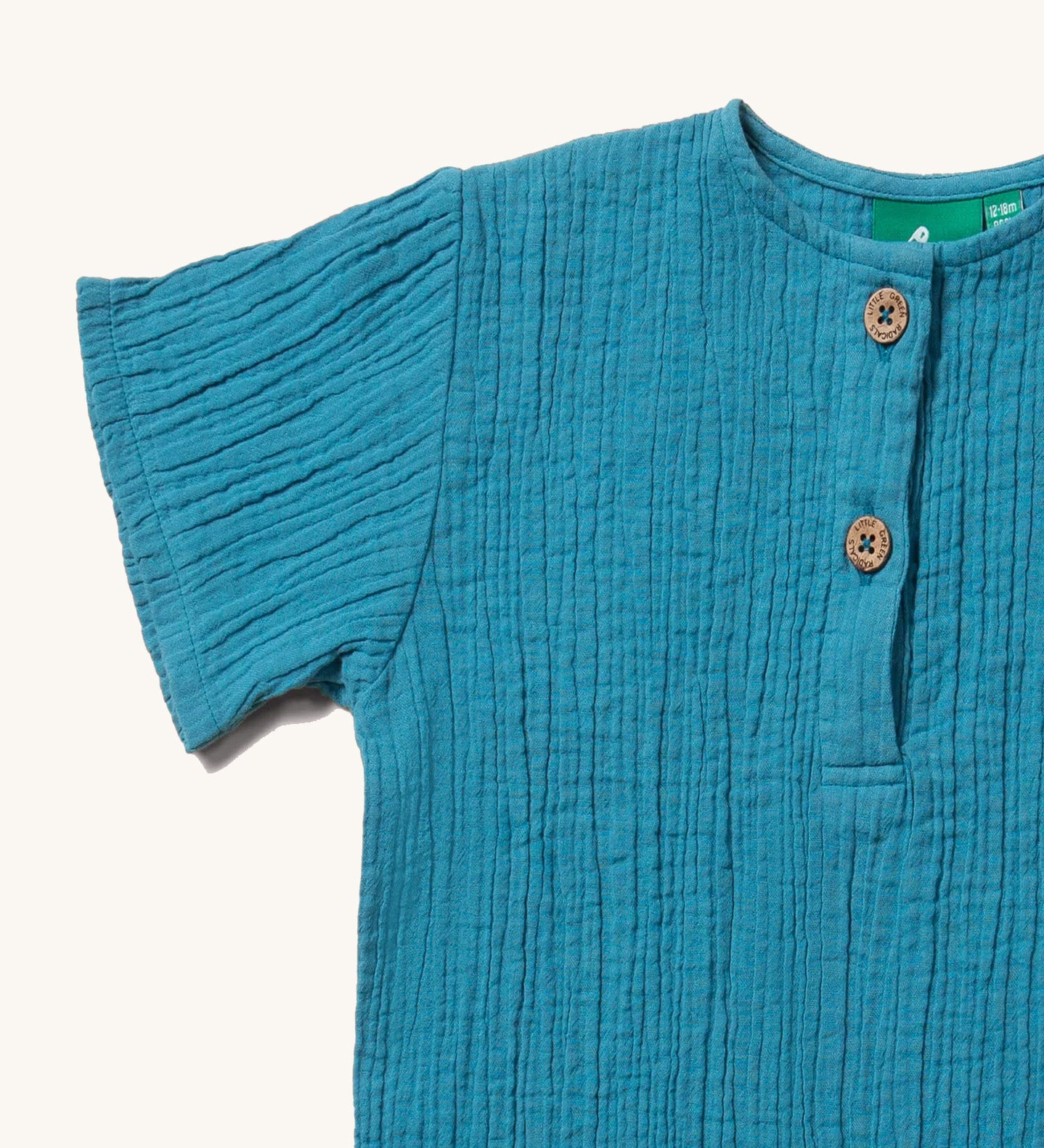 A closeup of the lightweight muslin material that is used to create the LGR organic cotton muslin Henley top.