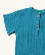 A closeup of the lightweight muslin material that is used to create the LGR organic cotton muslin Henley top.