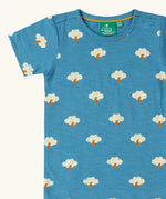 Close up of the Little Green Radicals blue all weather repeat print organic cotton short sleeve t-shirt.