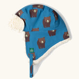 Little Green Radicals organic cotton sherpa-lined trapper hat in blue with a bears print.