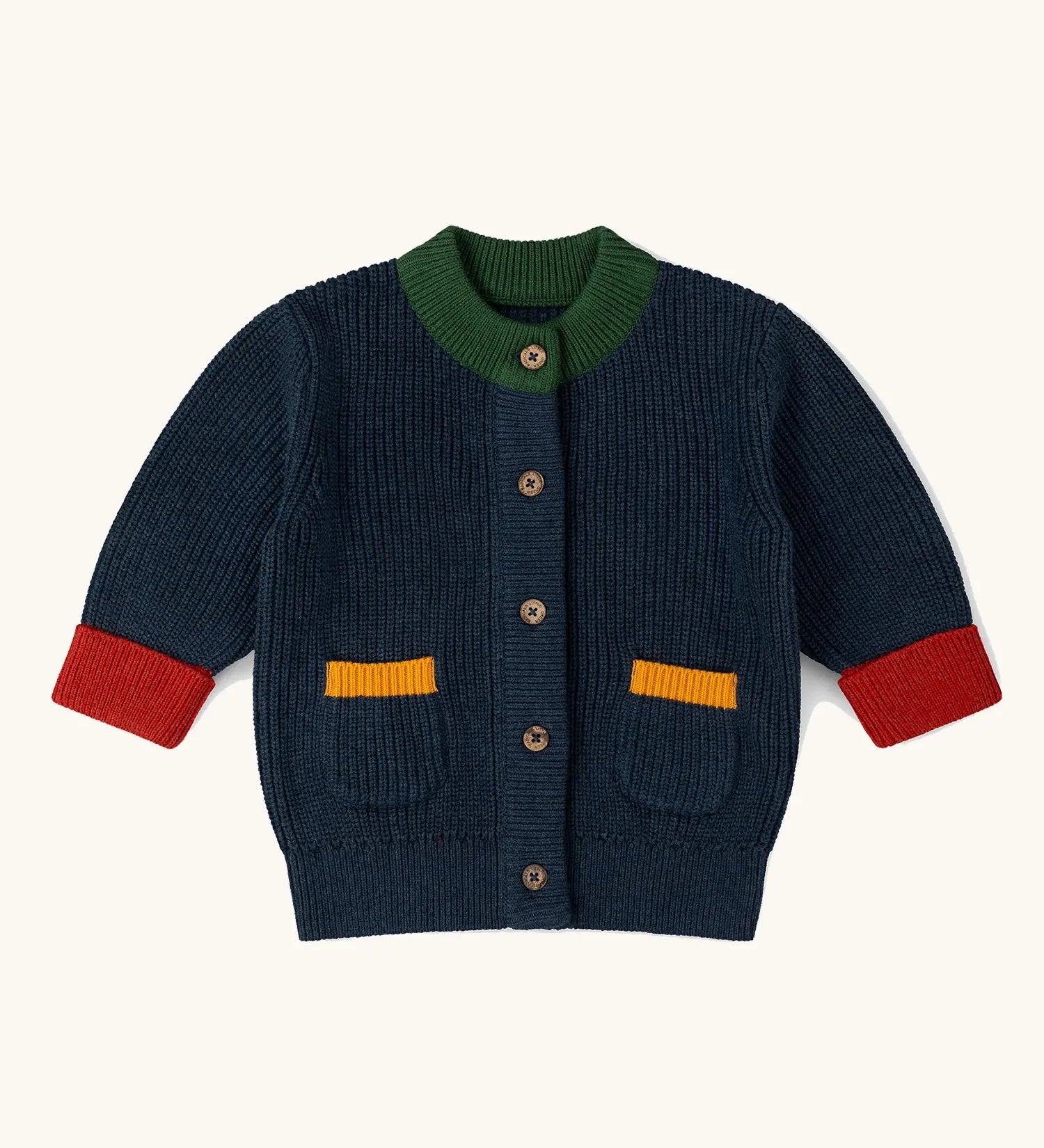 Little Green Radicals children's organic cotton snuggly knitted cardigan in midnight blue with green collar and red arm cuffs.