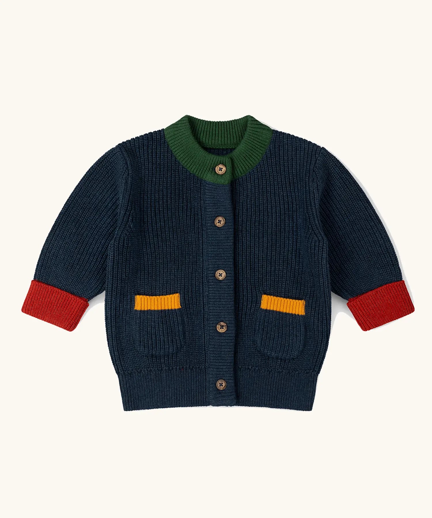 Little Green Radicals children's organic cotton snuggly knitted cardigan in midnight blue with green collar and red arm cuffs.