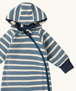 Close up of the Little Green Radicals navy blue penguins hooded reversible snug suit shown with the blue stripe design on the outdide.