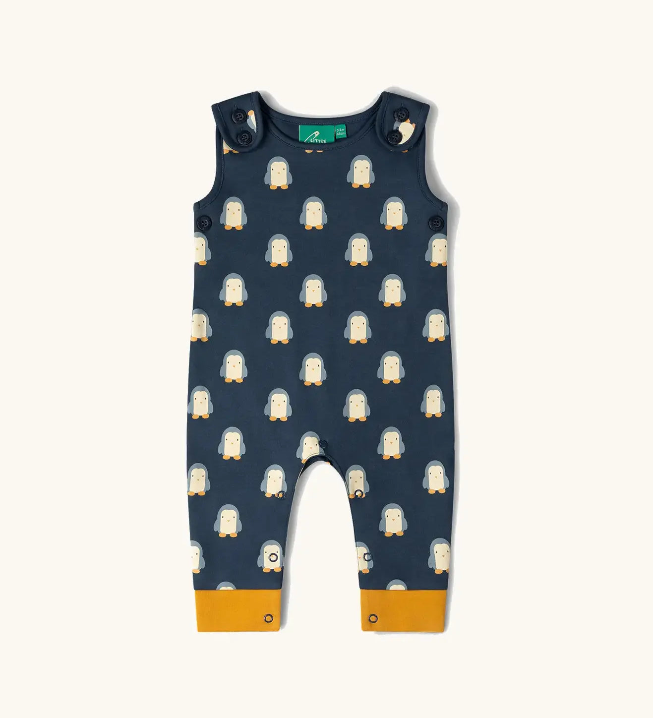 Little Green Radicals blue penguins everyday GOTS organic cotton dungarees with yellow leg cuffs.