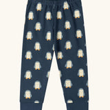 Trousers from the Little Green Radicals penguins kids organic cotton pyjamas. Navy long sleeved pyjamas with all over repeat penguin print. 