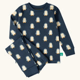 Little Green Radicals penguins kids organic cotton pyjamas. Navy long sleeved pyjamas with all over repeat penguin print. 