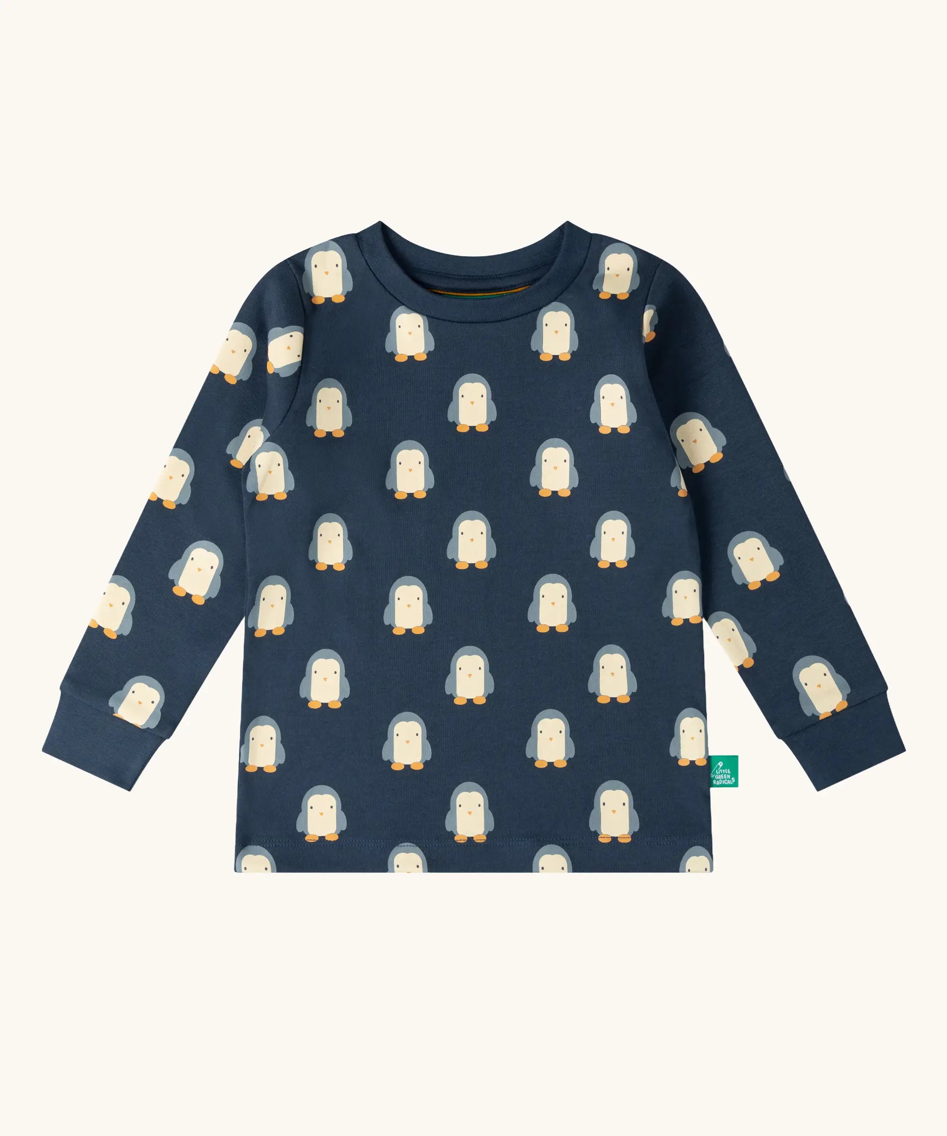 Long sleeve top from the Little Green Radicals penguins kids organic cotton pyjamas. Navy long sleeved pyjamas with all over repeat penguin print. 