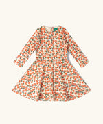 Little Green Radicals petals print organic cotton spinny dress. Light coloured dress with an all over repeat floral print.
