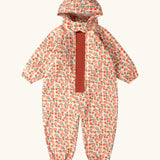 Little Green Radicals petals recycled waterproof winter suit. Light background with pink repeat al over flower print. 