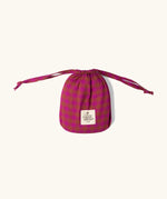 Matching storage bag from the Little Green Radicals organic cotton berry check adult classic pyjamas.