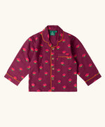 Top from the Little Green Radicals pink flowers print organic cotton classic purple pyjamas. Long sleeve button up top with matching trousers.