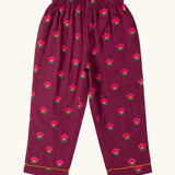 Trousers from the Little Green Radicals pink flowers print organic cotton classic purple pyjamas. Long sleeve button up top with matching trousers.