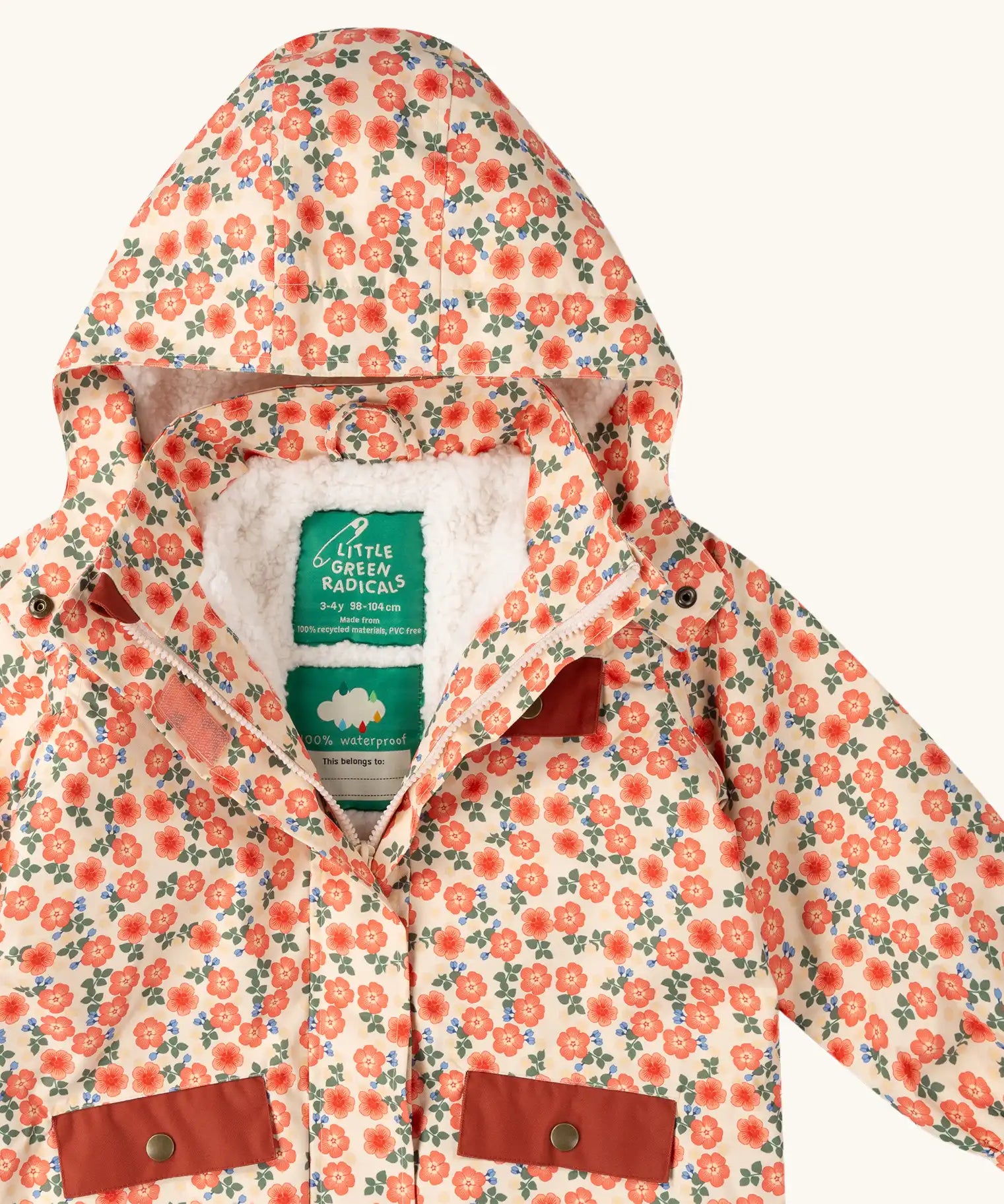 Close up of the Little Green Radicals pink petals recycled waterproof adventure lined Winter coat showing the hood and fleece lining.