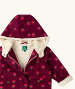 Close up of the sherpa fleece lining on the inside of the Little Green Radicals pink flowers pattern purple organic cotton sherpa toasty coat.