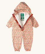 Little Green Radicals petals recycled waterproof winter suit with zip half open showing the fleece lining. Light background with pink repeat al over flower print. 
