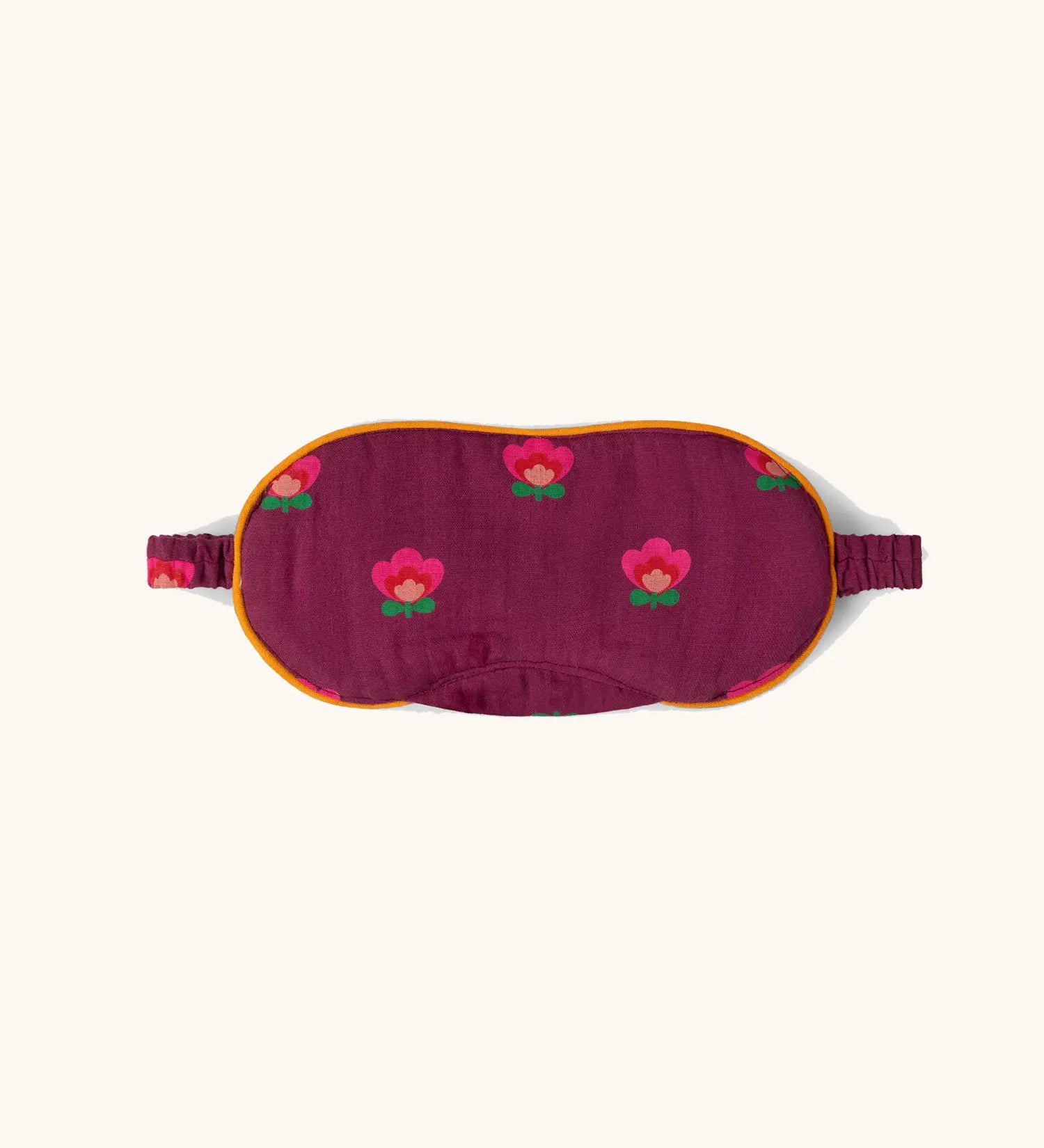 Little Green Radicals pink flowers organic cotton adult eye mask in purple. 