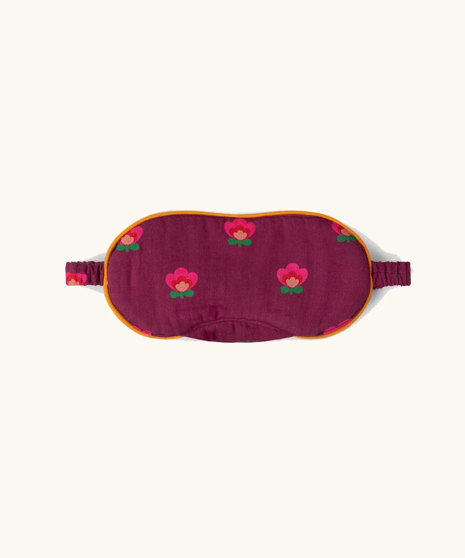 Little Green Radicals pink flowers organic cotton adult eye mask in purple. 