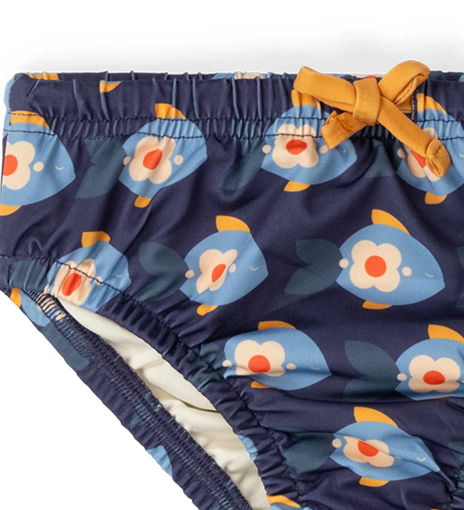 Close up of the yellow waist tie and elasticated waist on the Little Green Radicals blue Little Fish Reusable Swimming Nappy.