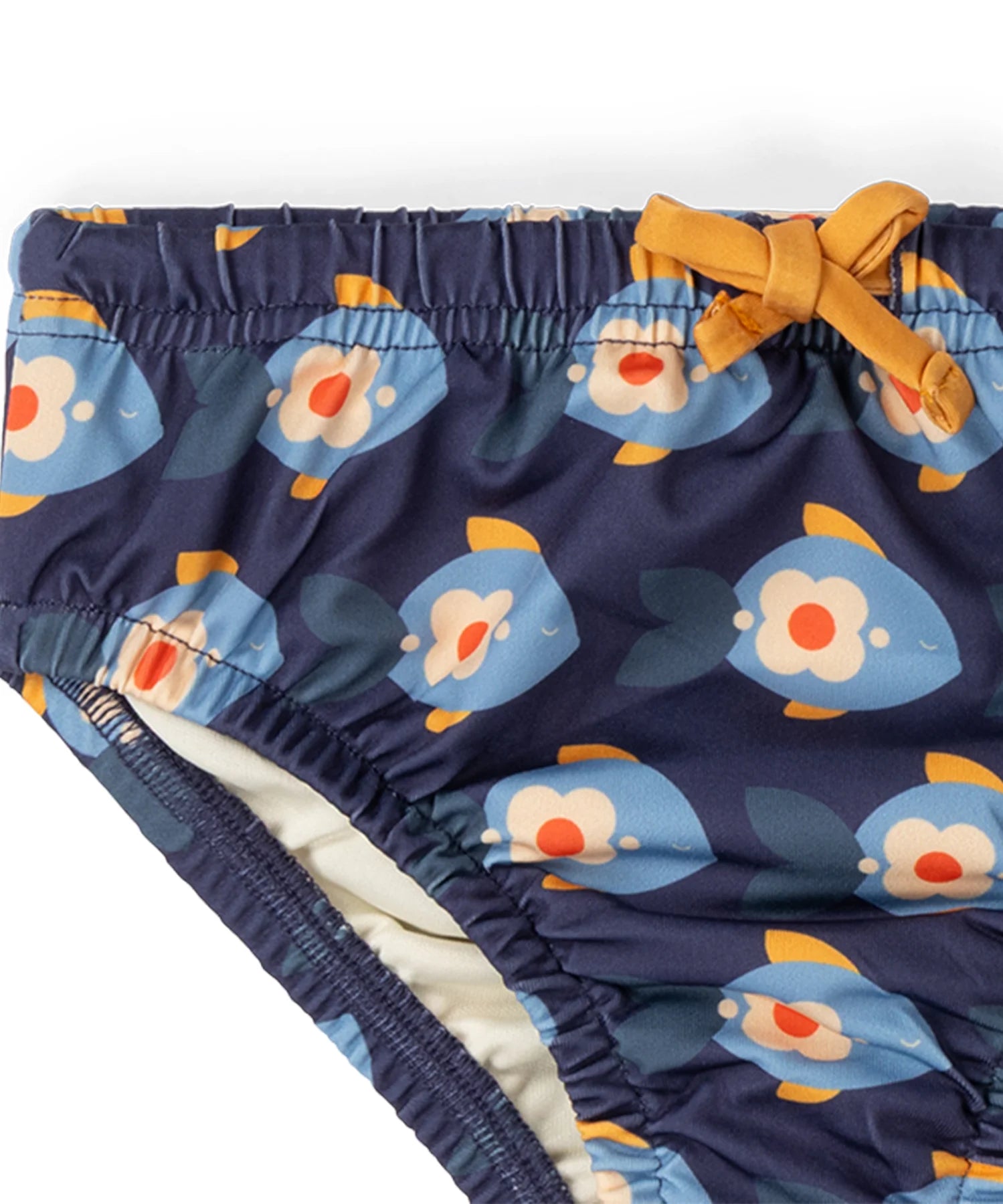 Close up of the yellow waist tie and elasticated waist on the Little Green Radicals blue Little Fish Reusable Swimming Nappy.