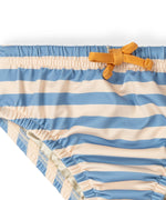 Close up of the elasticated waist on the Little Green Radicals Hazy Blue Striped Reusable Swimming Nappy with yellow waist tie.