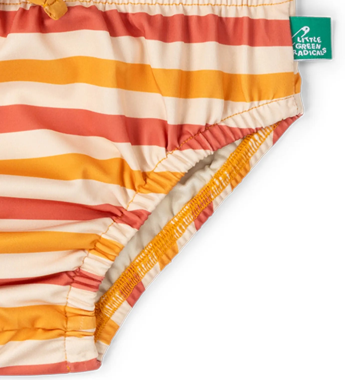 Elasticated legs on the Little Green Radicals Sorbet Striped Reusable Swimming Nappy. Cream, Red and yellow stripes with green logo tag on side.